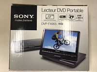 Sony Portable DVD Player DVP-FX955 box showing front with product and brand information