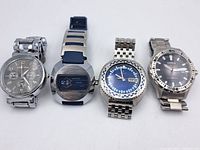 Photo showing all 4 watches together: Cote d'Azur chrono, Heritage digital, Stellaris analog, Lorus analog.