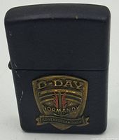 Front view of the Zippo lighter showing the D-Day Normandy emblem with 50 Years 1944-1994 inscription.