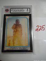 Front view of the 1980 OPC Star Wars trading card featuring Boba Fett with grading label.