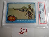 Front of the 1977 Star Wars trading card #18 showing C-3PO and desert scene with title 'Artoo-Detoo is Missing', graded EX-MT 6 by PSA.