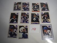 All 11 Toronto Maple Leafs hockey cards from 1985 OPC series shown laid out on a table, featuring players in uniform including Capt. Rick Vaive and Al Iafrate rookie.
