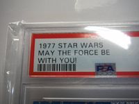 Close-up of PSA encapsulated Star Wars trading card label showing series and condition