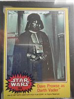 Close-up front of the vintage Star Wars trading card showing Darth Vader character image and text details.