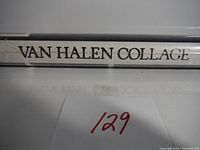 Close-up of the tube with "Van Halen Collage" printed on it.