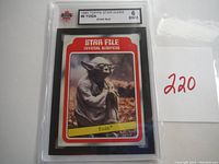 Front of 1980 Topps Star Wars #9 Yoda Star File trading card showing character image and red border design.