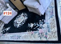 Full view of carpet under seating showing overall color and pattern