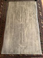 Top view of the coffee table showing live-edge acacia plank surface.