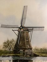 Close-up of watercolor painting showcasing windmill and surrounding natural features
