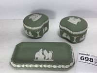 Image showing entire set of three pieces: trinket dish and two trinket boxes in sage green jasperware with white classical reliefs and floral garlands.