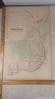 Full view of the antique map showing the entire City of Kingston's layout including streets and harbors.