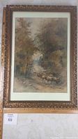 Full view of framed watercolour painting showing sheep on a path amid trees with ornate carved frame and dimensions indicated.