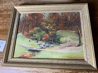 Full front view of the framed oil painting showing overall composition and frame wear