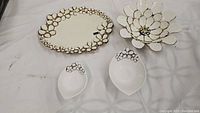 Full set shown - platter, large flower bowl, two small white dishes