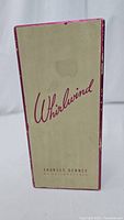Box of the cologne bottle showing Whirlwind branding and Frances Denney Philadelphia at the bottom, with some wear visible on the edges of the box.