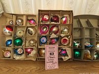 Three cardboard boxes containing vintage glass Christmas ornaments