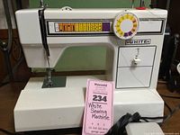 Front view of White Sewing Machine model 1505 showing stitch selector panel with stitch pattern icons and brand name White on the front.