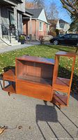 Full front view of mid-century modern credenza outdoors