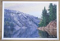 Full view of the giclee print showing lake, rocky hills, and trees with artist signature visible.