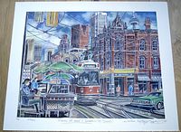 Full view of the print showing streetcar and surrounding buildings in colorful urban scene.