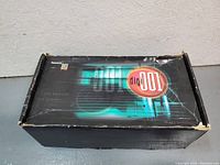 Closed Digi001 system box showing original branding and wear on edges.