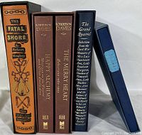 Five Folio Society hardcover books lined up with their original slipcases showing titles and spines.