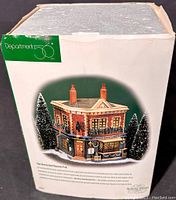 Box of Department 56 Dickens Village Series The Horse And Hounds Pub showing product image and branding.