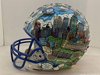 Left-side view showing painted Indianapolis skyline, blimp and Children’s Museum detail