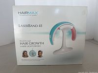 Front of boxed HairMax LaserBand 41 showing branding and model