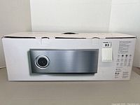 Box exterior front showing product image and packaging.