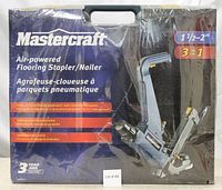 Image of front of sealed box with Mastercraft branding and stapler/nailer illustration including 1 1/2 inch to 2 inch size range and 3-in-1 capability
