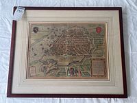 Full view of framed map showing city plan and frame
