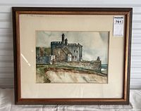 Full view of framed watercolour painting showing castle scene, matting, and wood frame.