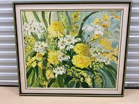 Full front view of framed floral painting
