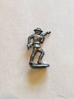 Individual lead soldier figurine, showing details such as helmet, rifle with bayonet, and uniform details. The figure stands approximately 1.5 inches high.