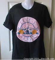 Full front view of black Guns N' Roses T-shirt on mannequin, showing size medium fit and main logo design.