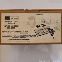 Closed box with label indicating Craftsman router letter template set model 335-2573