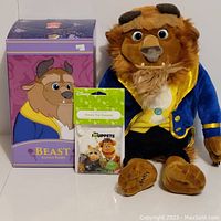 Front view of Beast plush, Scentsy box, and Disney The Muppets scented pak in packaging