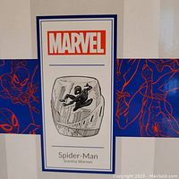 Front of box showing Marvel logo and Spider-Man warmer illustration.