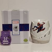 Boxed Marvel Spider-Man Scentsy warmer displayed with one purple scented bar