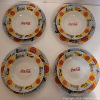 Overhead image showing all 8 pieces including 4 dinner plates and 4 soup/salad bowls stacked and arranged in 4 sets.