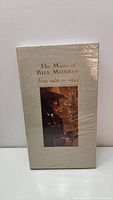 Front of the box set showing the title 'The Music of Bill Monroe from 1936 to 1994' and a colored photo of Bill Monroe.