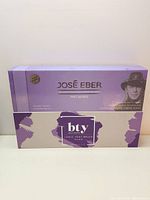 Box showing branding and product names for Jose Eber Pro Series titanium infused straightening iron and BTY ionic heat brush in purple.