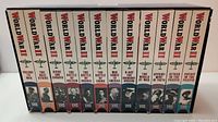 Photo of the full 12 volume World War II VHS box set showing titles on each tape.