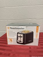 Front side of the Toastmaster toaster box displaying the product image and brand.