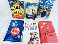 Front covers of 6 Bill Bryson books showing titles and artwork.