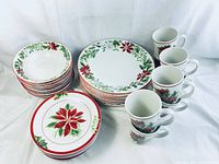 Full set of two 4-piece sets including plates, bowls, and mugs, arranged and shown together.