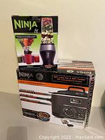 Boxed Ninja Fit personal blender set including 2 cups, lids, and pro extractor blade