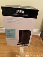 Front of retail box showing DualMax branding and image of unit