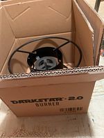 High-pressure burner inside an open cardboard box labeled Darkstar 2.0 Burner.